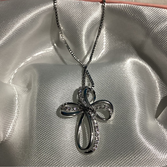 Faithful Elegance Ribbon Style Silver Twisted Cross Pendant Necklace - Picture 7 of 16